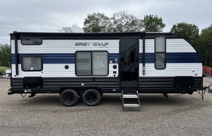 double axle, 15 foot awning, front and rear storage