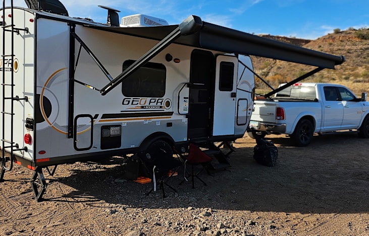 Full off grid comfort, tv w dvd player (great for kids entertainment), stereo, full bath and kitchen with stove, microwave and oven.  Some games provided. 14 foot awning for ample shade when needed.
