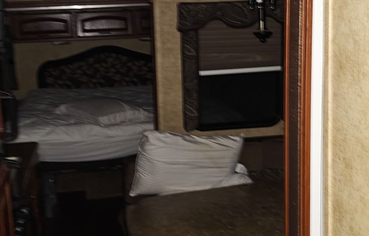 Queen slide out and dinning area sleeping area