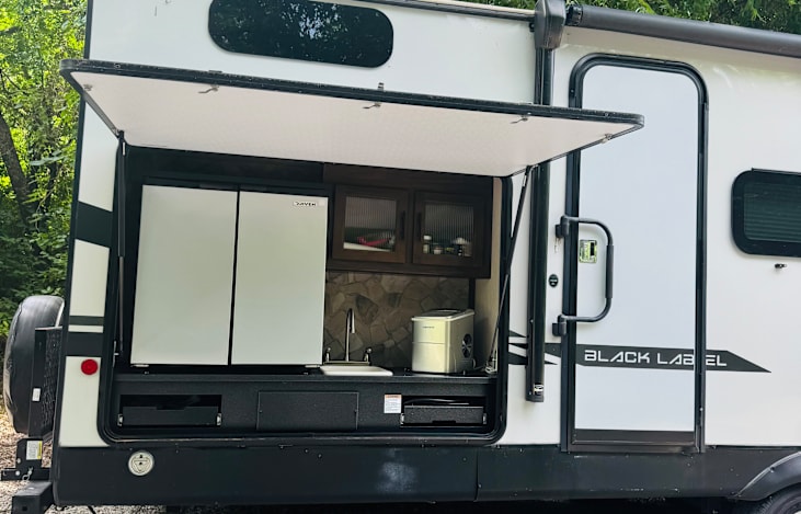Outdoor kitchen and sink