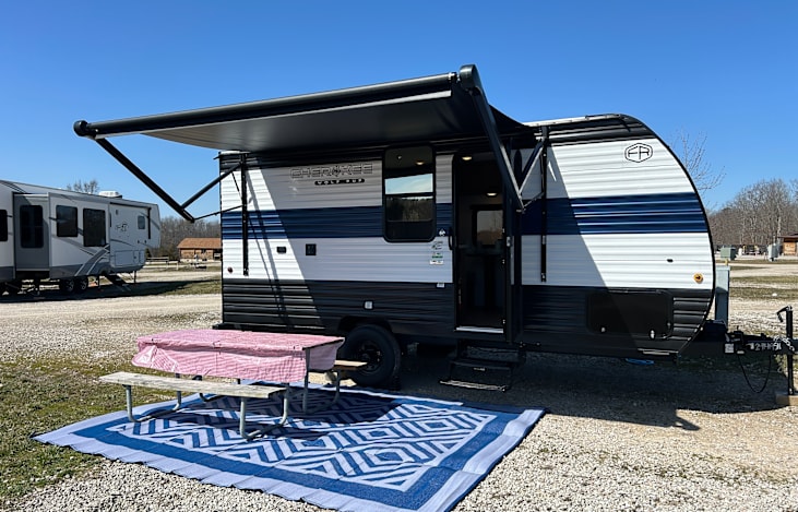 Outside. Comes with 12x9 outdoor rug