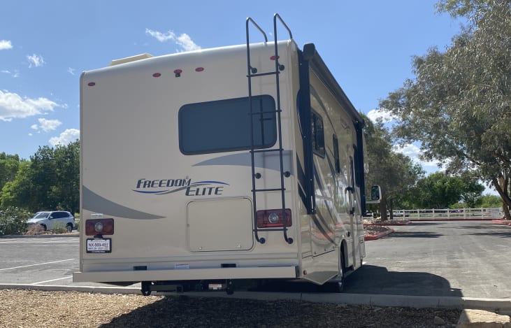Rear View of the RV. There is a ladder but NO climbing on roof