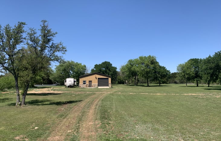 Enjoy 5+ acres of green lush field with no neighbors to bother you, no city noise, and lots of perfect viewing space for the Solar Eclipse or star gazing.