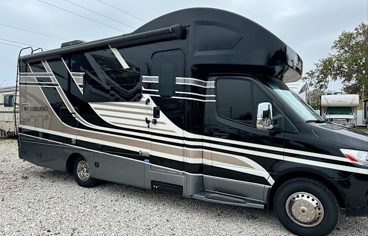 Electric Awning (camp chairs in lower storage)