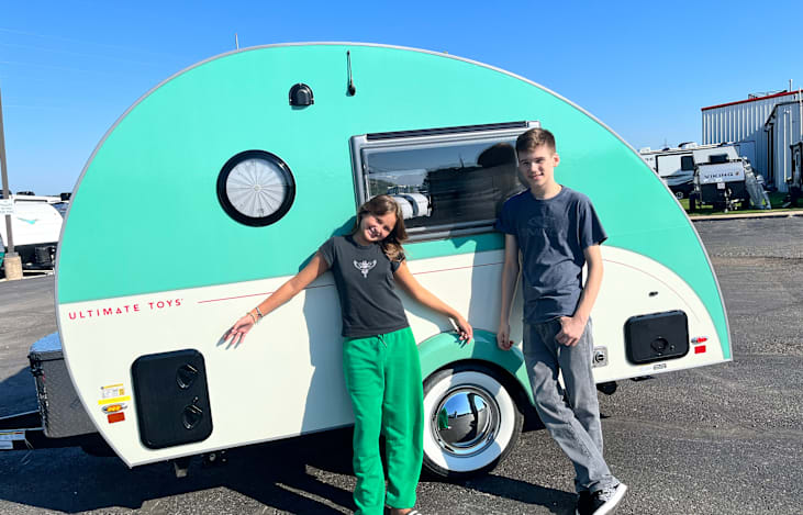 My grandkids love camping in the trailer.