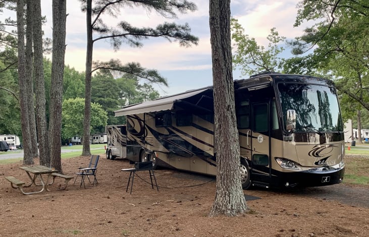 Beautiful coach, gas griddle, and matching motorcycle trailer