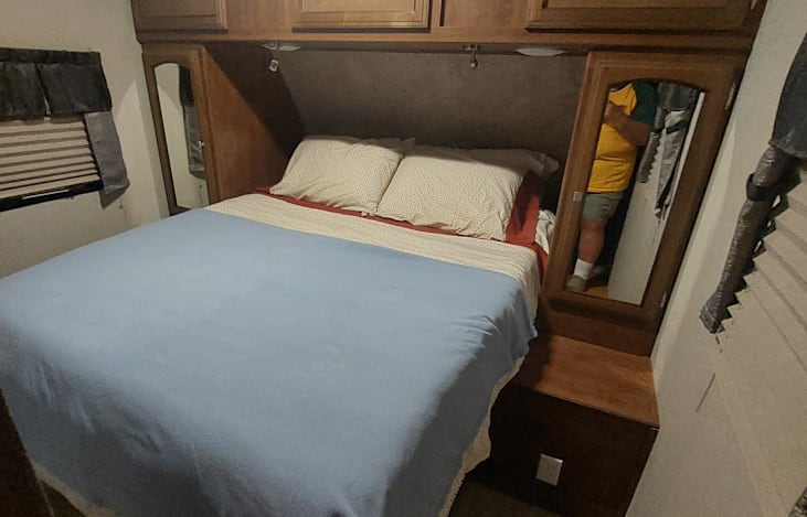 Queen Bed and Closets in bedroom