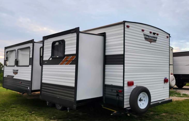 Camper features 3 slides. One in the living room and 2 in the bunkouse.
