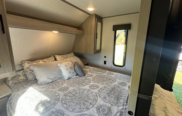 Private Queen bedroom with side tables.