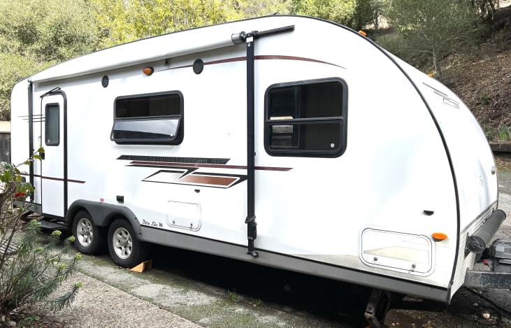 24ft Sleek Ultra Light Aerodynamic Trailer with a slide out for plenty of living space.