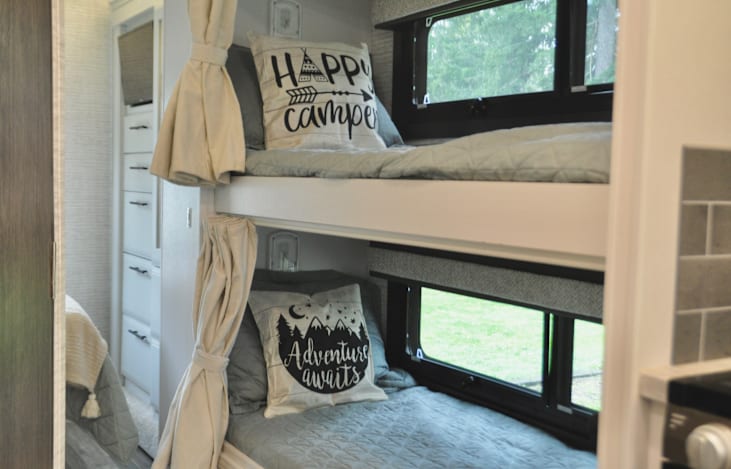 Bunks in hallway for the kids. Each bunk has it's own 12" tablet with charger.