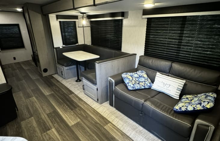 Kitchen and Living Room Space. 
Couch and Kitchen table both fold into beds.