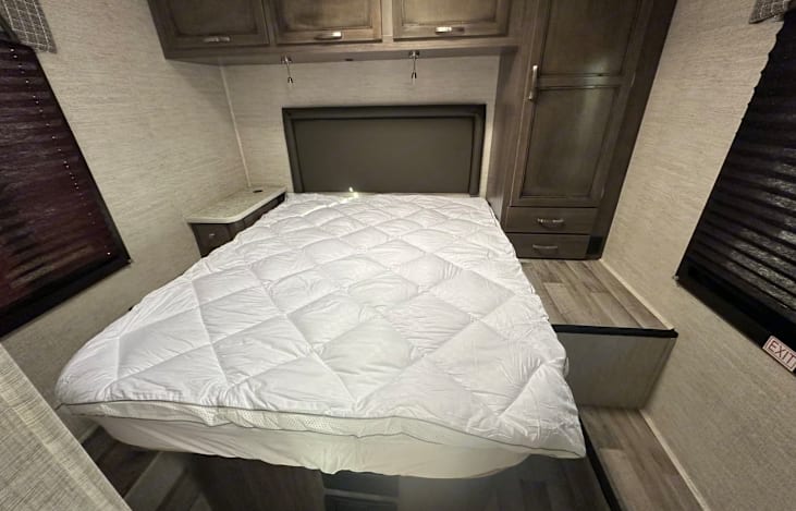 Queen bed with plenty of storage for clothes.  Power options include both USB and 12v plugs.