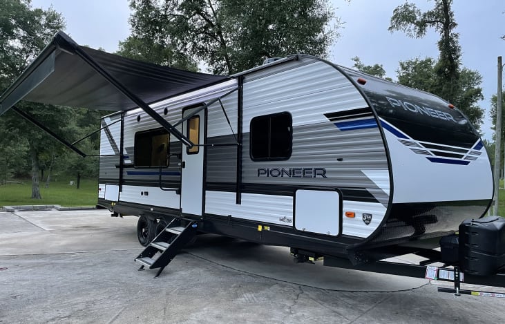 Camper with awning