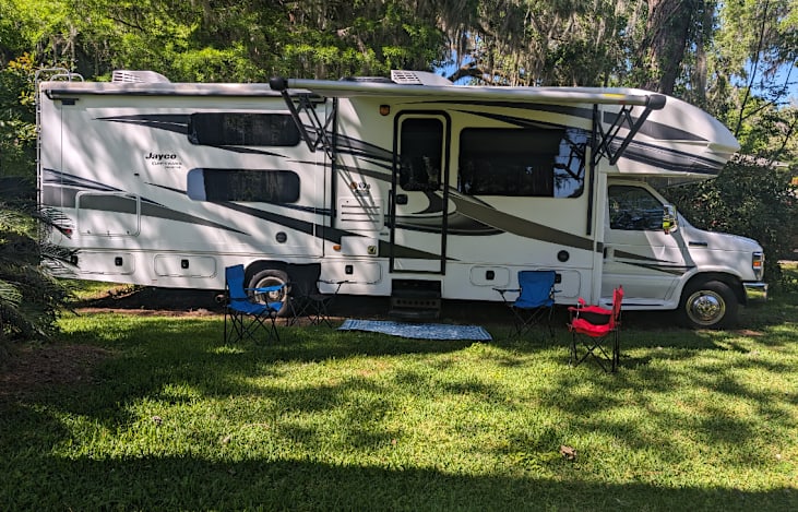 We provide 4 camping chairs and a rug. If you have your favorite camping chair, bring it along as there is plenty of storage throughout the RV.
