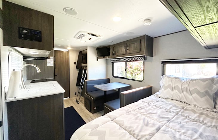 Our RV includes a RV queen size bed with upgraded mattress for a comfy night sleep as well as an extra set of sheets.