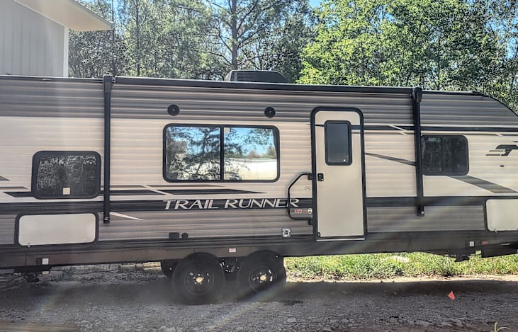 2022 Heartland Trail Runner, with flip-down stairs and extendable awning on the side!