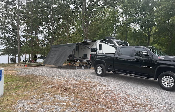 Awning extended with sun shade attached