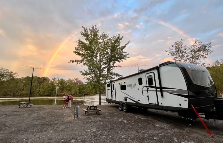 We were setting in Gadsden for a weekend trip and one of the younger kids exclaimed, "Look ... a wainbow!" We turned around and this was our view. My red level is still leaning on the camper. :)