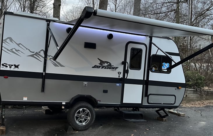 Awning with lights and exterior speakers.