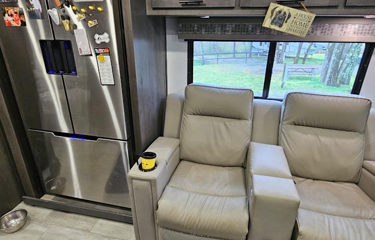 No RV is complete without two electronic recliners and a fuĺl-sized refrigerator.