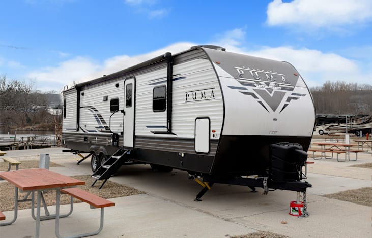 Experience "Gratitude" with our 2022 Palomino Puma 32RBFQ2 located near Table Rock Lake near Branson Missouri and Lake Of The Ozarks. Thank you from us at StoneMountainRVs(dot)com