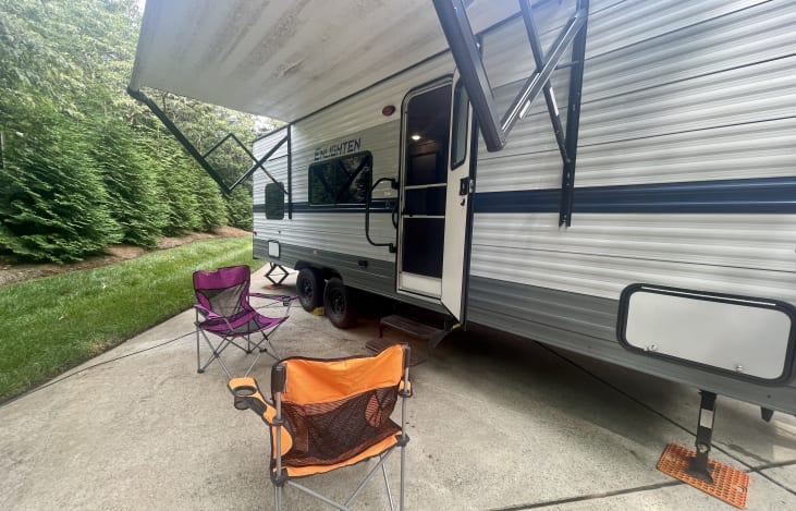 Exterior entry and retraceable awning.