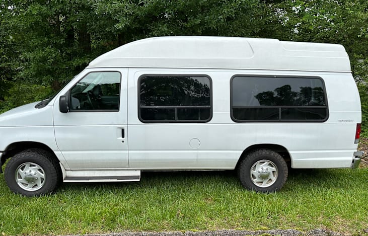 Aerodynamic high roof. 6 ft height standing room with running boards in the front and steps w/ rail for  easy side door access