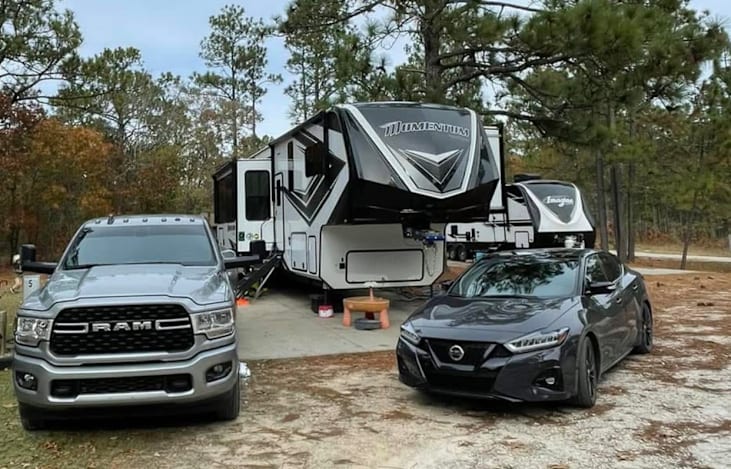 Most spots in campgrounds, have enough room for RV and two Vehicles.  Enjoying the time on the ramp.