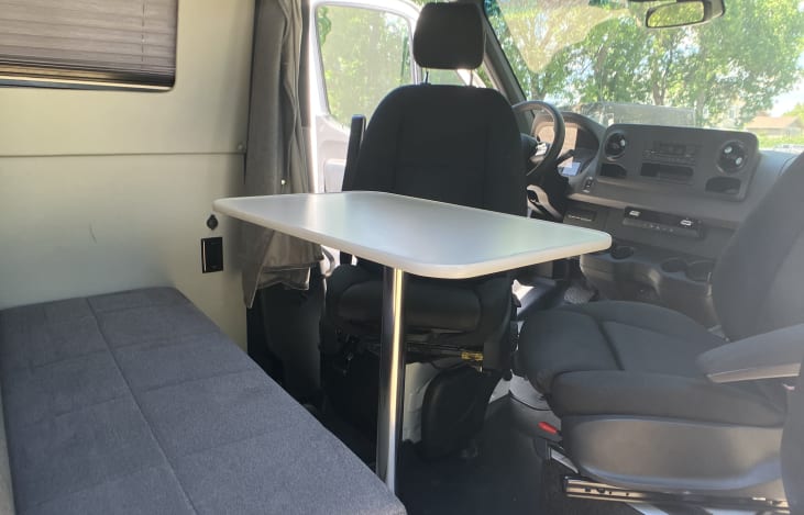 Table set up with front seats swiveling