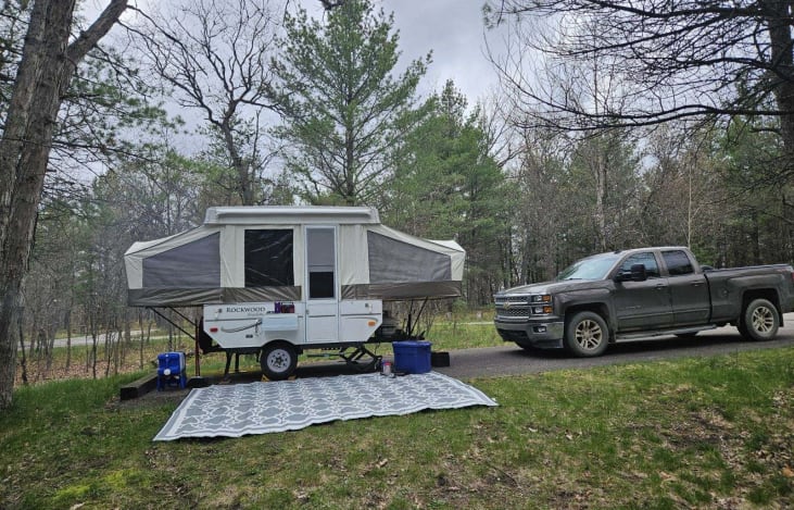 Camping rug comes with camper.