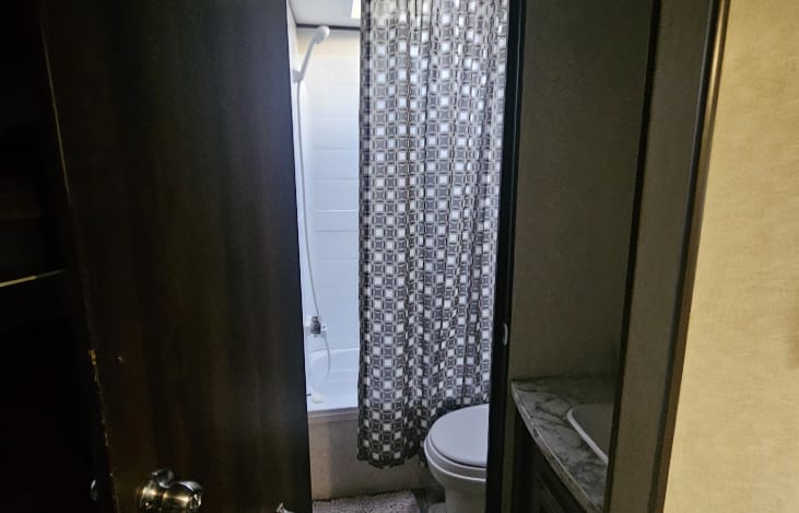 The shower has a sunlight above