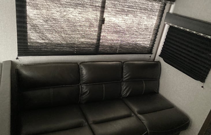 Couch folds out into a bed that can sleep up to two people.