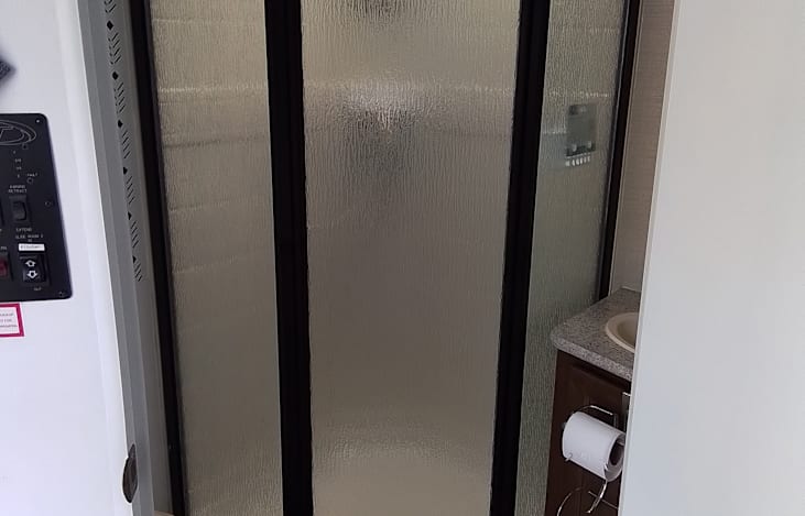 corner shower in bath