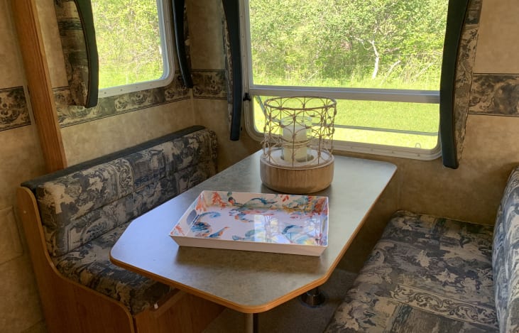Dinette can be made into a bed, as well as extended for more seating.