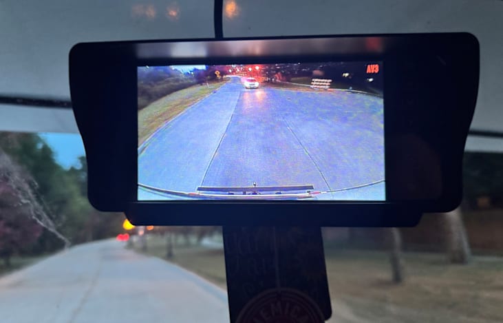 Backup camera view - active while driving and will change when your turn signal is on to show blindspots