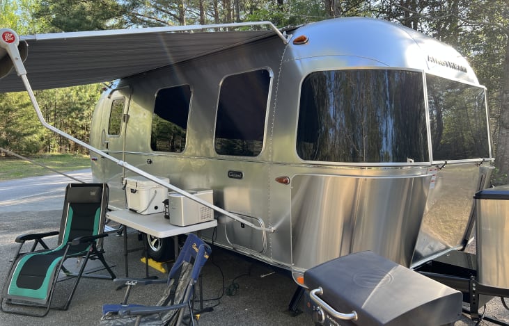 Side view. Chairs and Blackstone grill all setup.