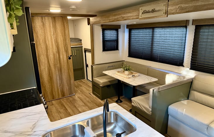 Welcome home! Dining seating for 4-6 that converts into a full bed.