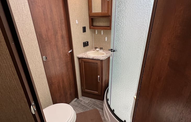 Conveniently located bathroom, perfect for a quick shower, or morning teeth brushing.