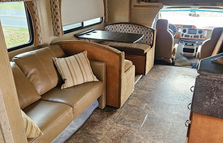 Dinette converts to sleeping area, couch has a pull out air mattress