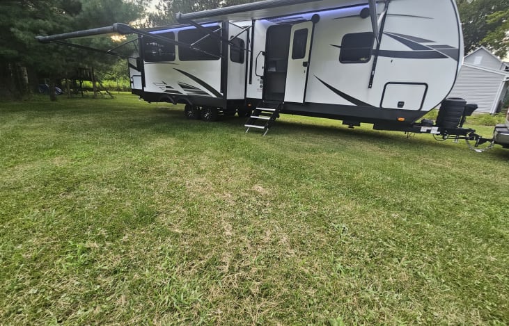 Plenty of outdoor shelter with the 2 large awnings.