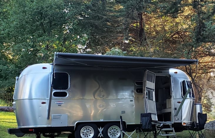 Awnings on both sides and rear, with the main camping awning being automatic, push of a button.