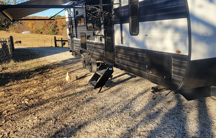 Roll out awning provides plenty of cover, outdoor refrigerator, wDouble door entrance