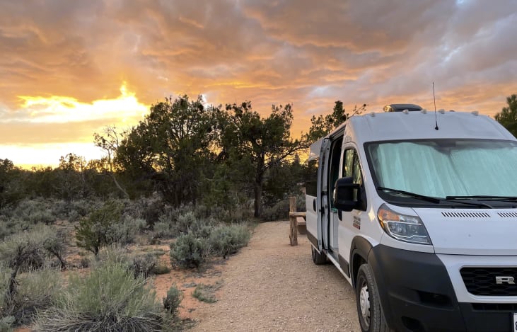 Enjoy beautiful campsites in the campervan. Backup camera allows you to fit in many spaces. All window coverings included