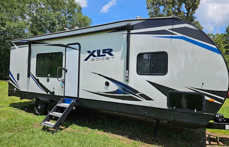 Awning, outdoor speakers and TV mount