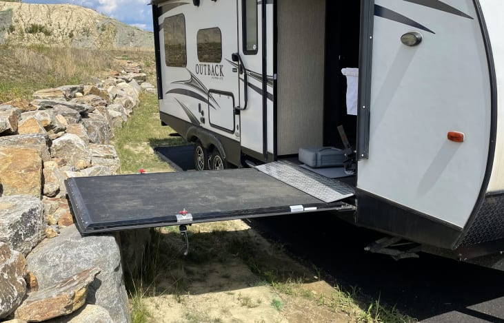 Wheelchair access or ramp for ATV or golf cart. Not a party deck...

We also have a screen for the 50" door to allow great ventilation, or great sleeping if you are boondocking solo.