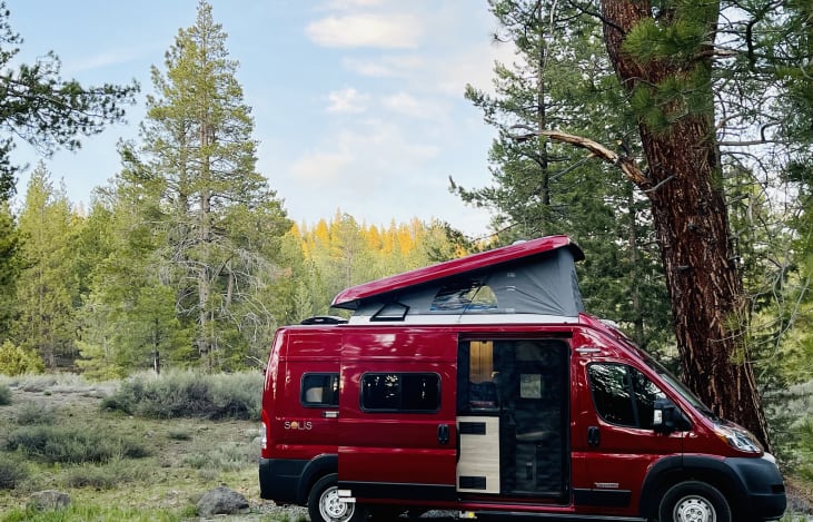 Ready for Adventure!
This photo shows the exterior of the rig with the upper sleeping area deployed. The upper area has canvas sides and three zippered "windows".