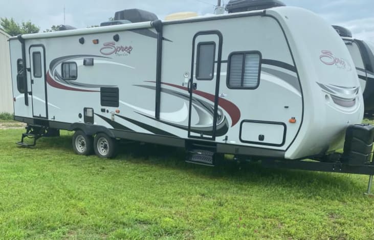 Equipped with everything including the kitchen sink!   This RV has plenty of room and  a home-like feeling. It has 2 slides and separate entrances for living area and master bedroom.